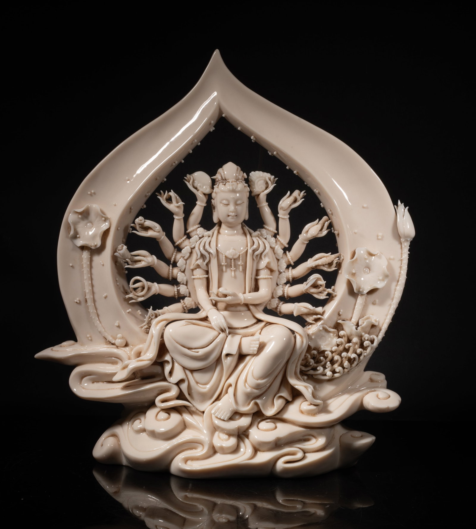 Estate Chinese Blank De Porcelain Sculpture: Chinese white glazed porcelain Kuanyin sculpture, with multiple pairs of arms and hands. Approx. 12.5*15*6 inch.
