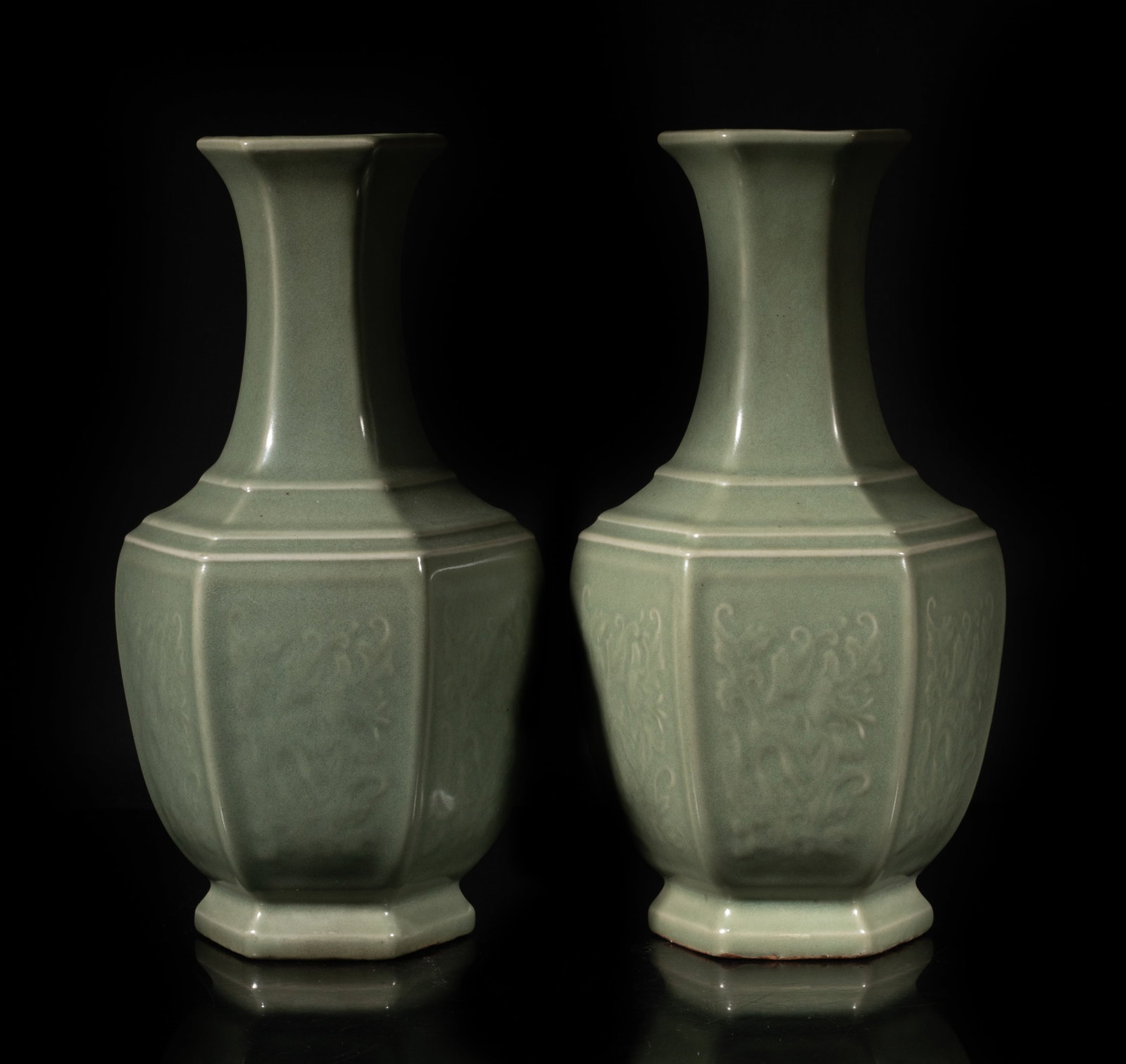 Estate Two Chinese Longquan Porcelain Vases: Two Chinese Longquan type celadon glazed porcelain vases incised with flowers. Approx. 11.7*6.2 inch (each). The Estate of the Store Closed Sale, Pasadena, CA. 2025.