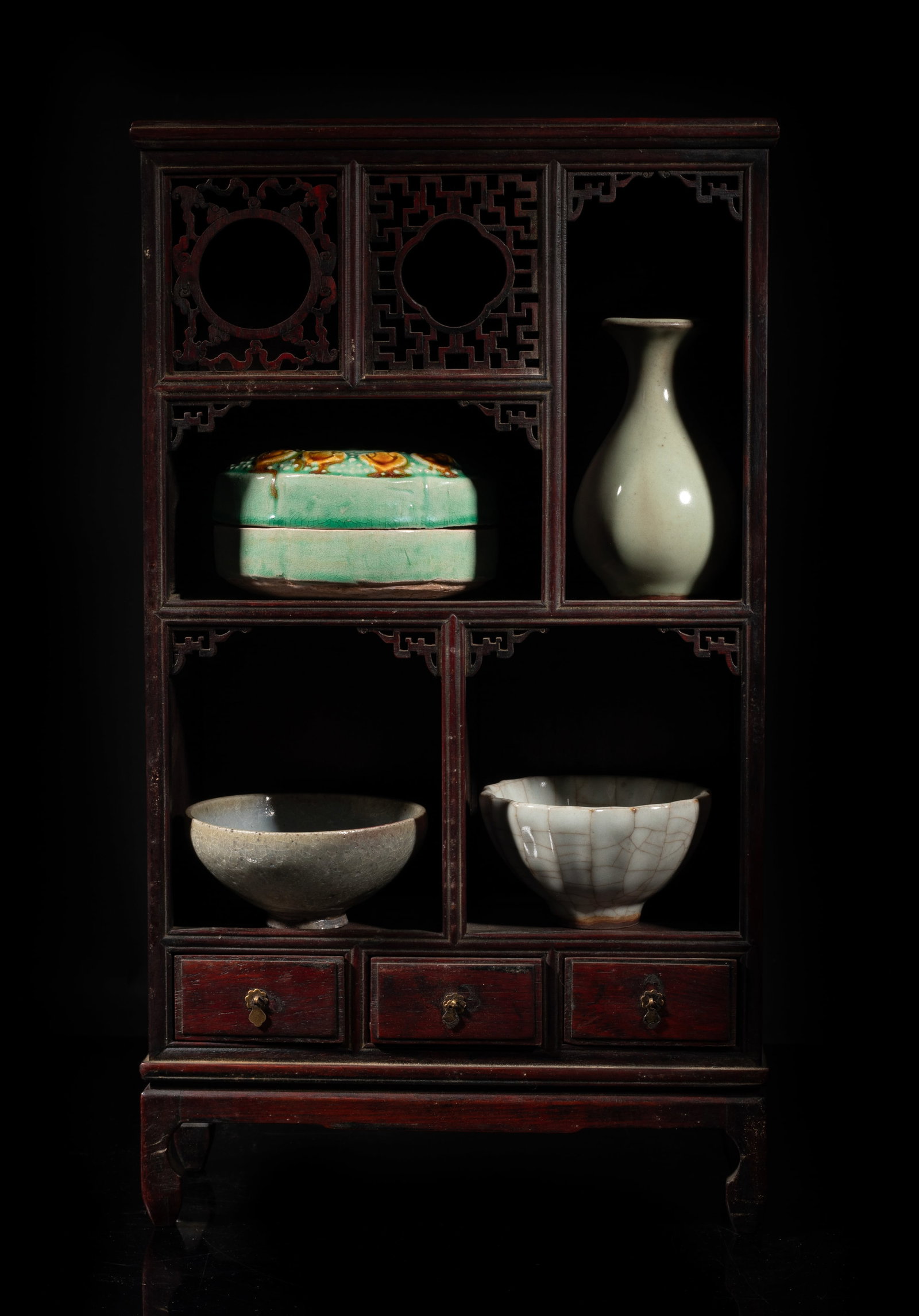 Estate Chinese Wood Cabinet w/ Porcelain Wares: Including a covered box, a cabinet vase, and two cups, with wood cabinet. Approx. 15*8.6*3.6 inch (cabinet size). The Estate of the Jason H. Mays. CA. 2004.