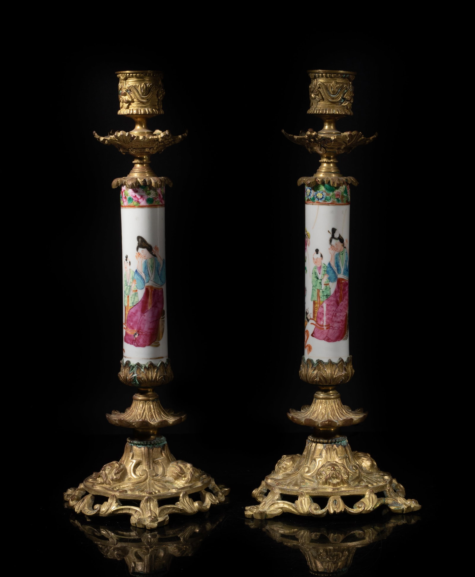 Two Chinese Gilt Metal, Porcelain Candlesticks: Two Chinese gilt metal and enameled porcelain candlestick holders. Approx. 11.6*4.8 inch (each).