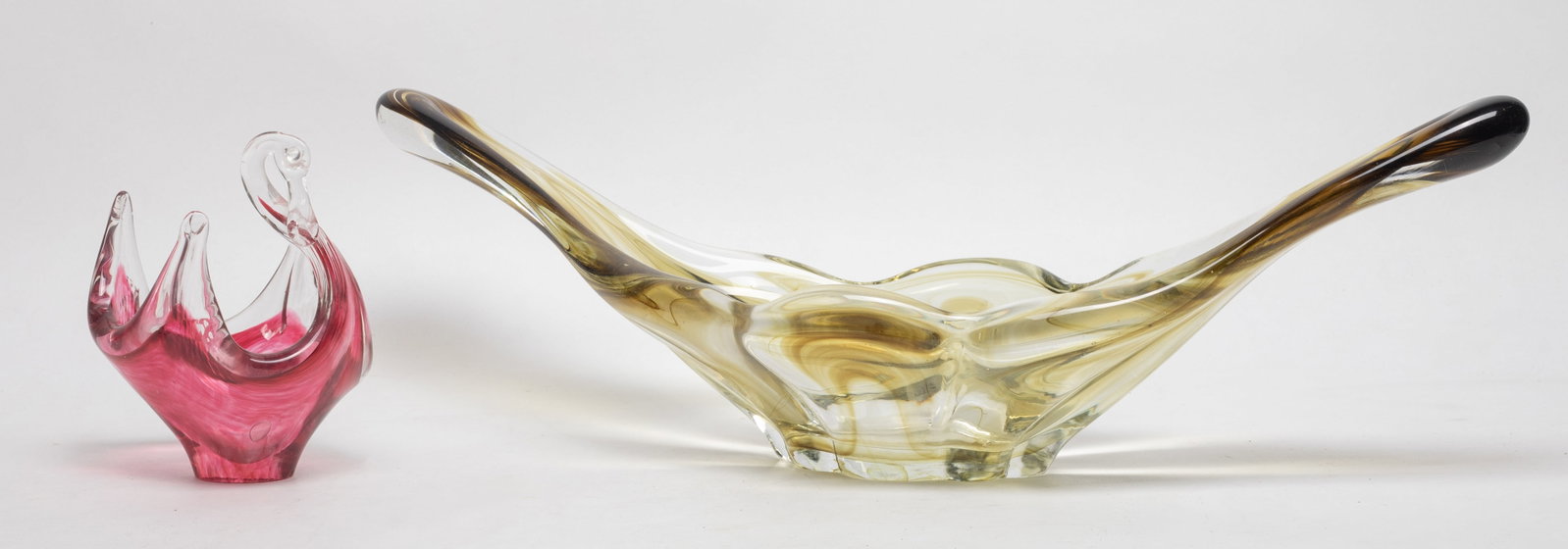 Two Vintage Art Glass Pots: Including one yellow glass centerpiece bowl, and one pink glass swan bowl. Approx. 19.5*5.1 inch (larger)