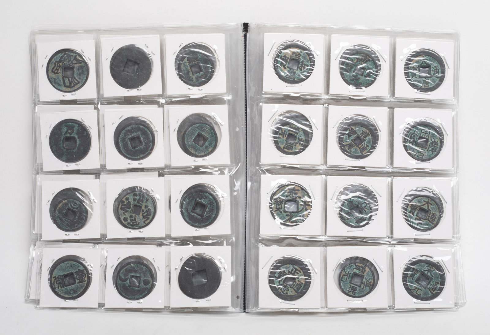Set Chinese Export Fengshui Coins: Large set of Chinese Fengshui coins, with album. Size varies.
