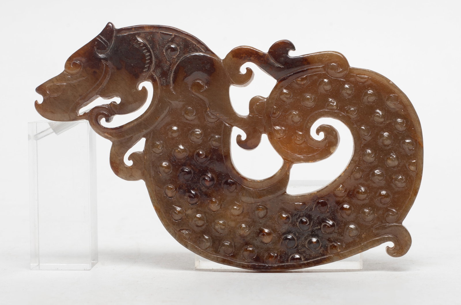 Chinese Russet Jade Dragon Pendant: Large Chinese russet jade pendant of sinuous dragon form. Approx. 4.6*2.75 inch.