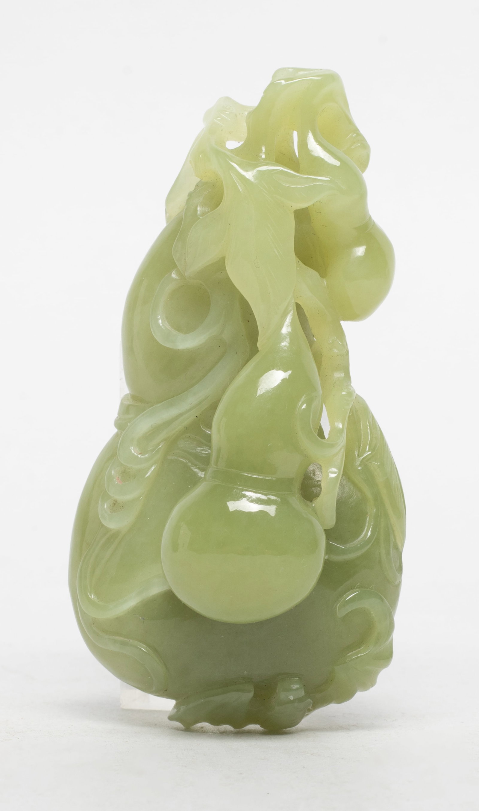 Estate Chinese Jade Carved Gourd Pendant: Chinese jade gourd pendant, detailed with smaller gourds and bat. Approx. 3.5*1.77*1.28 inch.