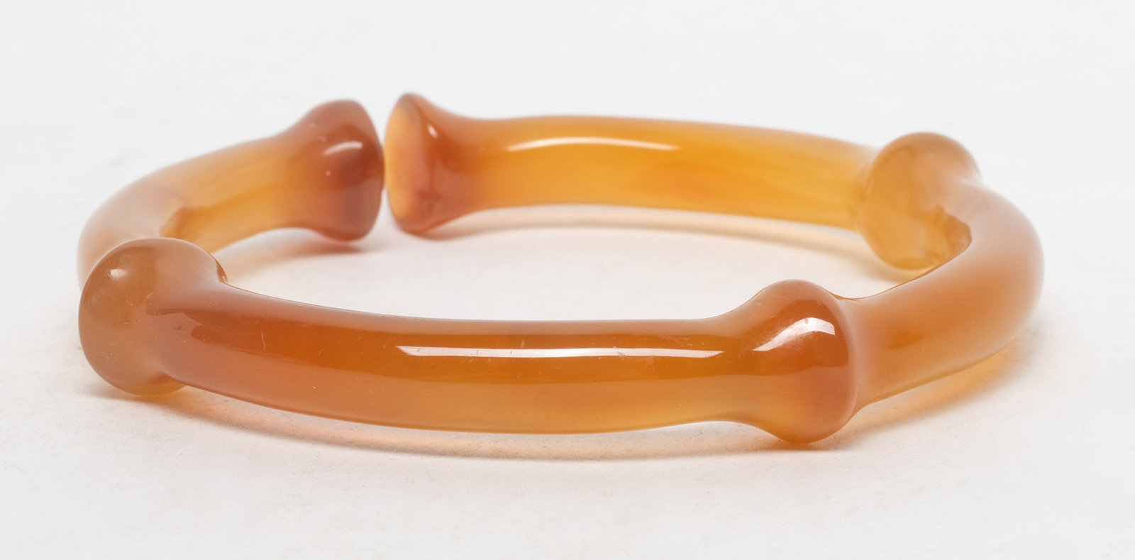 Unusual Chinese Cameo Agate Bangle: Chinese cameo agate carved bangle. Approx. 3.6 inch outer diameter, 2.7 inch inner diameter.