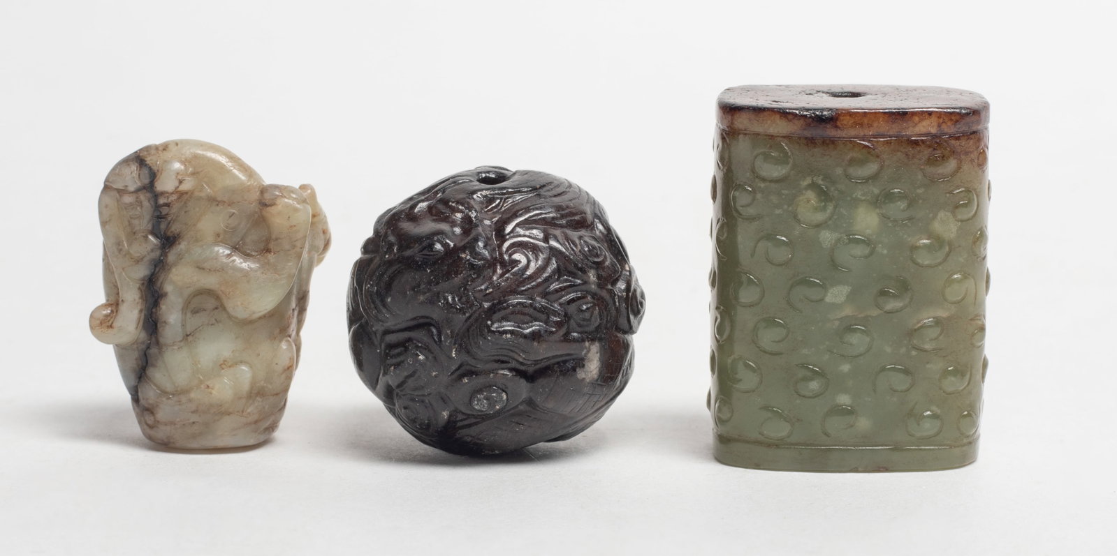 Set Chinese Jade Carved Beads: Set of three Chinese jade carved large beads. Approx. 1.42*1.08*0.73 inch (largest).