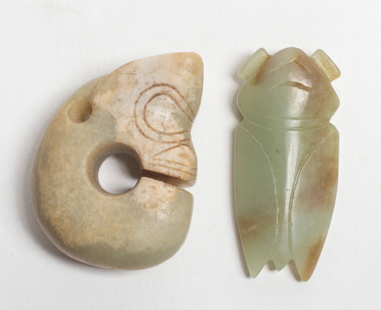 Two Chinese Export Jade Carvings: Chinese jade carved cicada and archaic pig-dragon sculptures. Approx. 2.1*1.55*0.7 inch (larger).