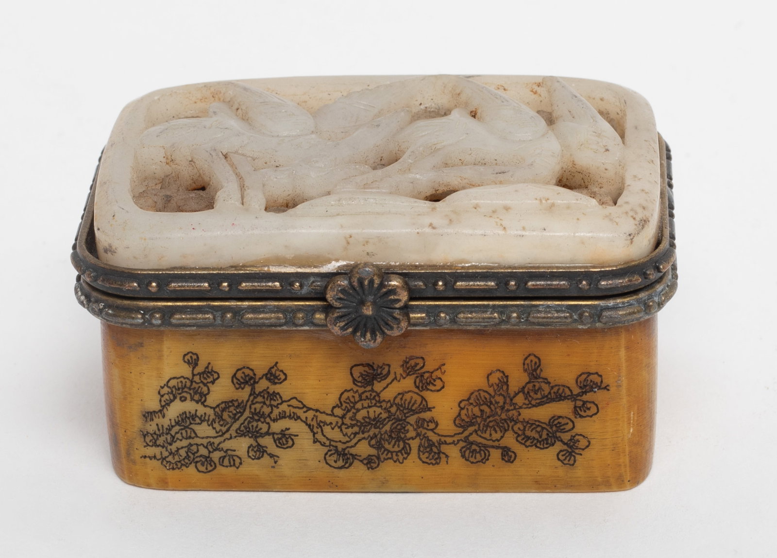 Chinese Jade/ Stone Carved Box: The box of rectangular form, applied in a yellow tone, the top carved with an openwork featuring cranes scene, the box body incised with blossom floral scrolls. Approx. 1.34*2.43*1.29 inch