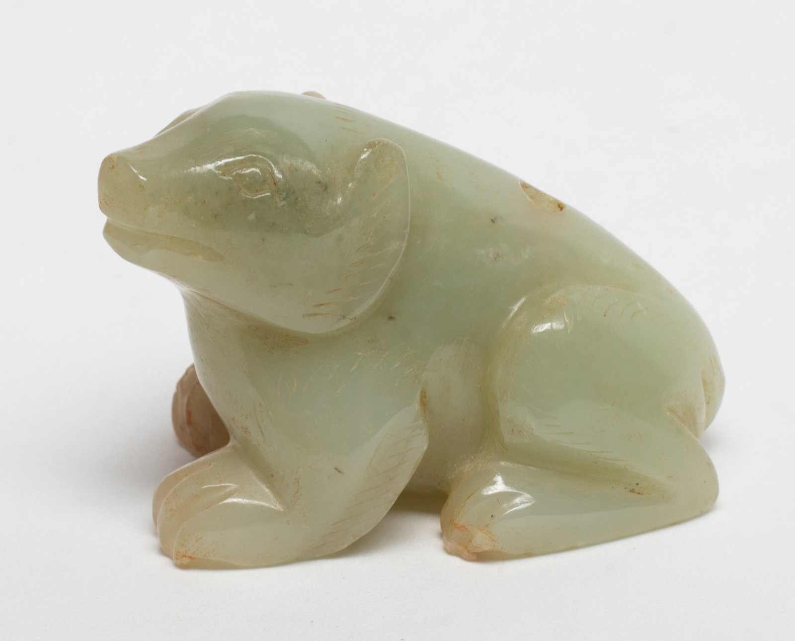 Chinese Jade Carved Beast Pendant: The jade beast with its back legs folded under the curled body, its head turned to the left side. Approx. 1.43*2.29 inch