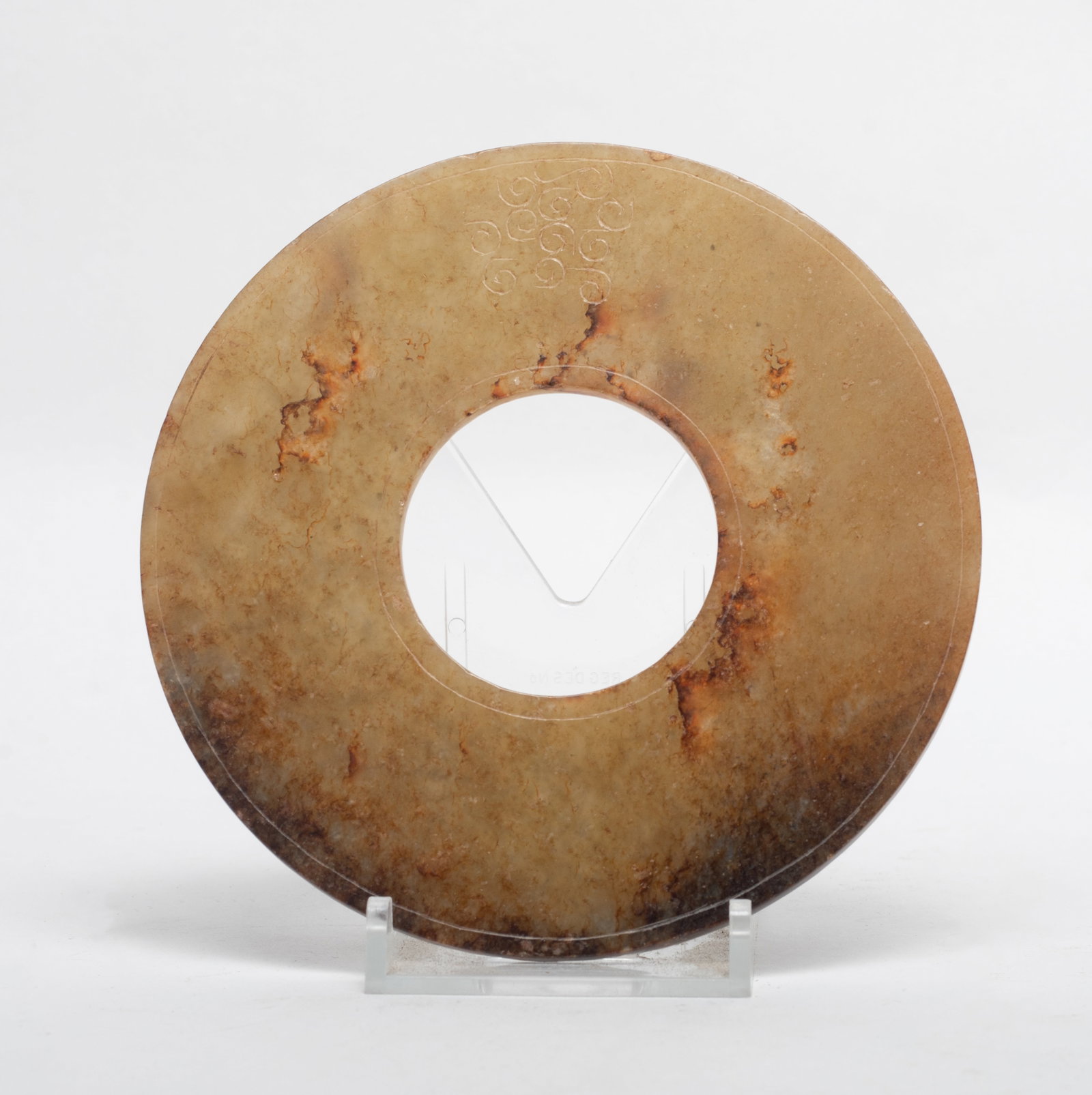 Chinese Russet Jade Carved Bi: Carved to both sides around the central aperture with the ?rain?patterns. Approx. 4.48*1.16 inch
