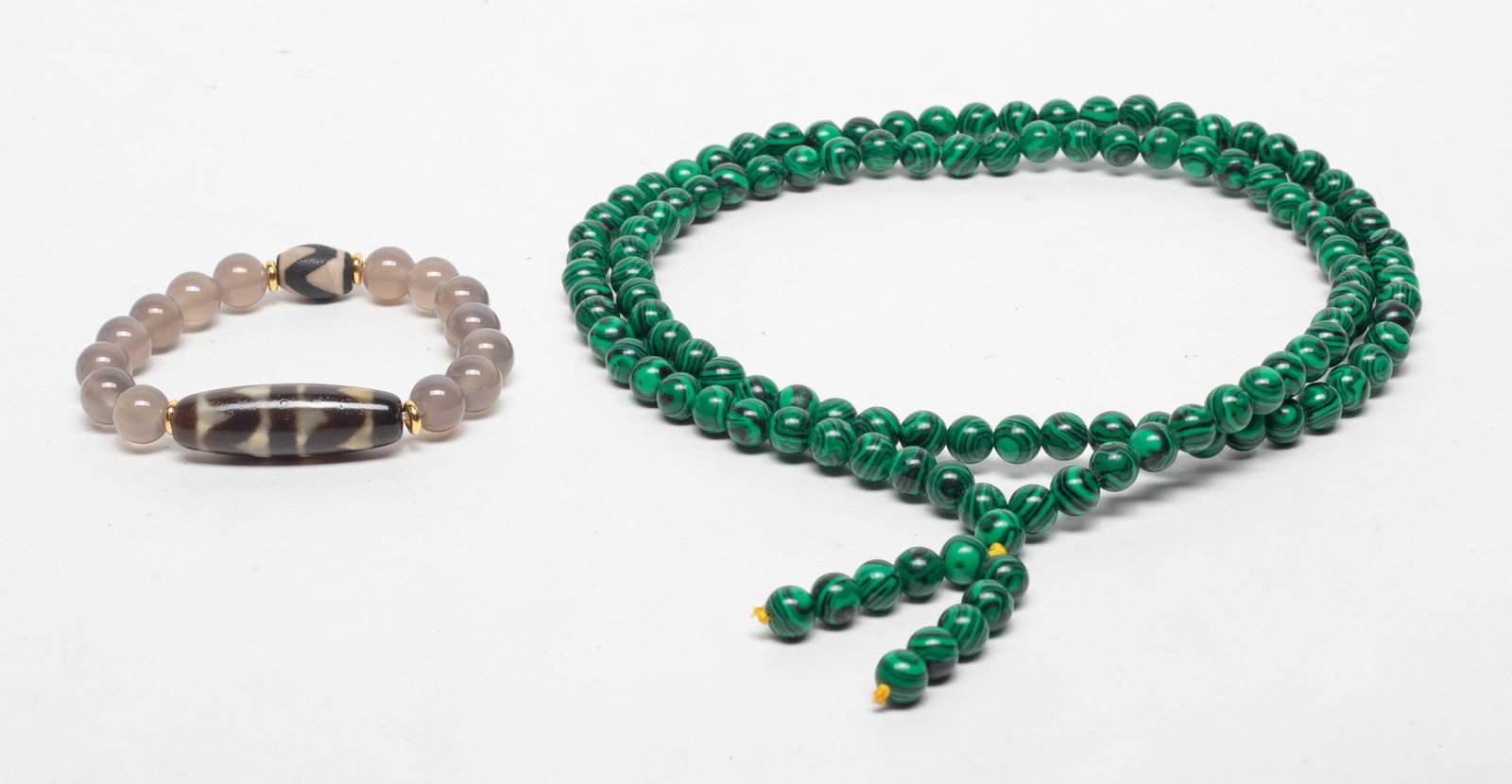 Chinese Stone Long Necklace, Dzi Beads: Including a long bead necklace, and an agate bead and dzi bead bracelet. Approx. 32 inch L (necklace size).