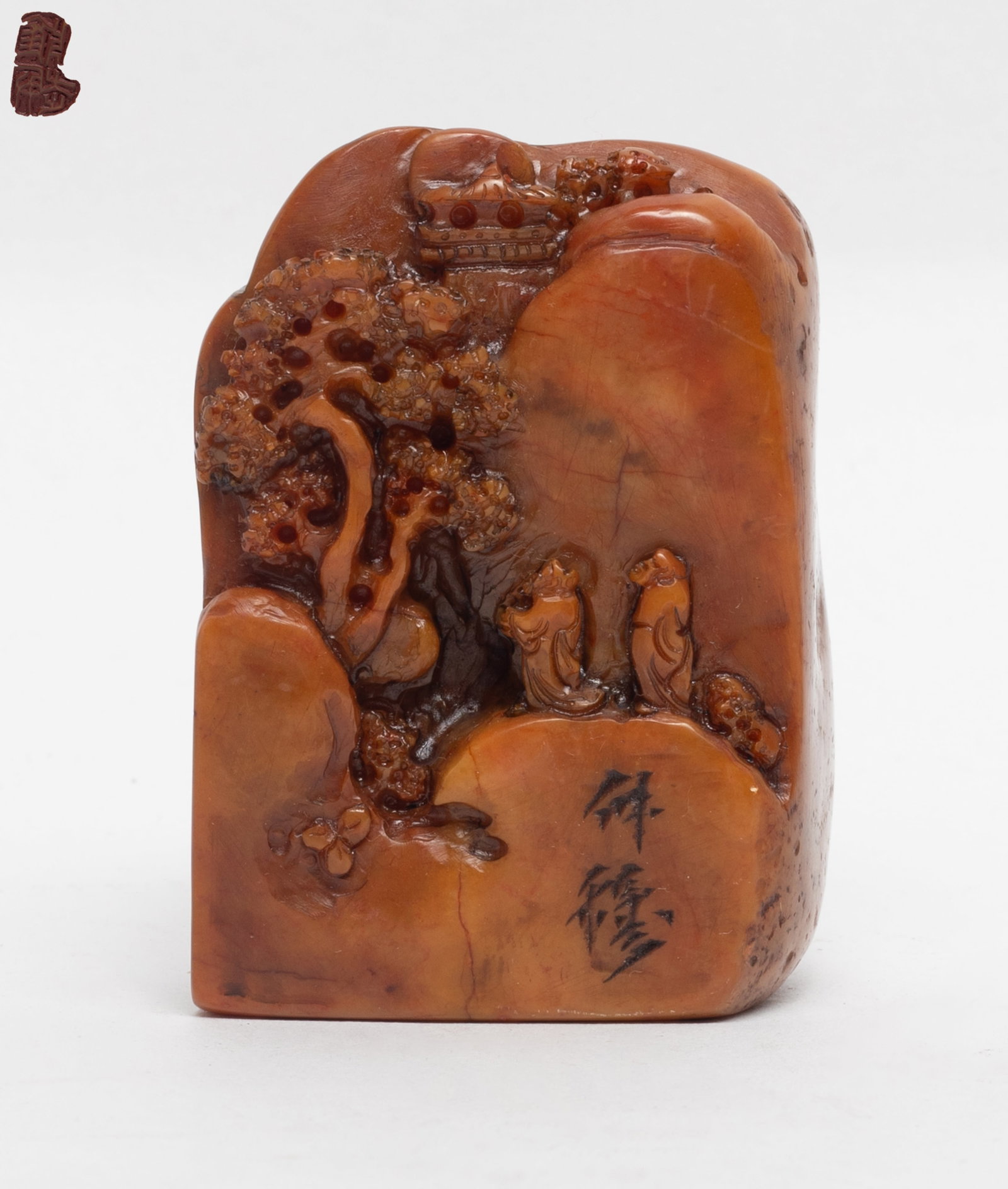Vintage Chinese Shoushan Stone Seal: The shoushan stone of rectangular form, carved in high relief of the continuous landscape scene depicting figures standing under the pine tree. Approx. 2.8*1.96*1.34 inch