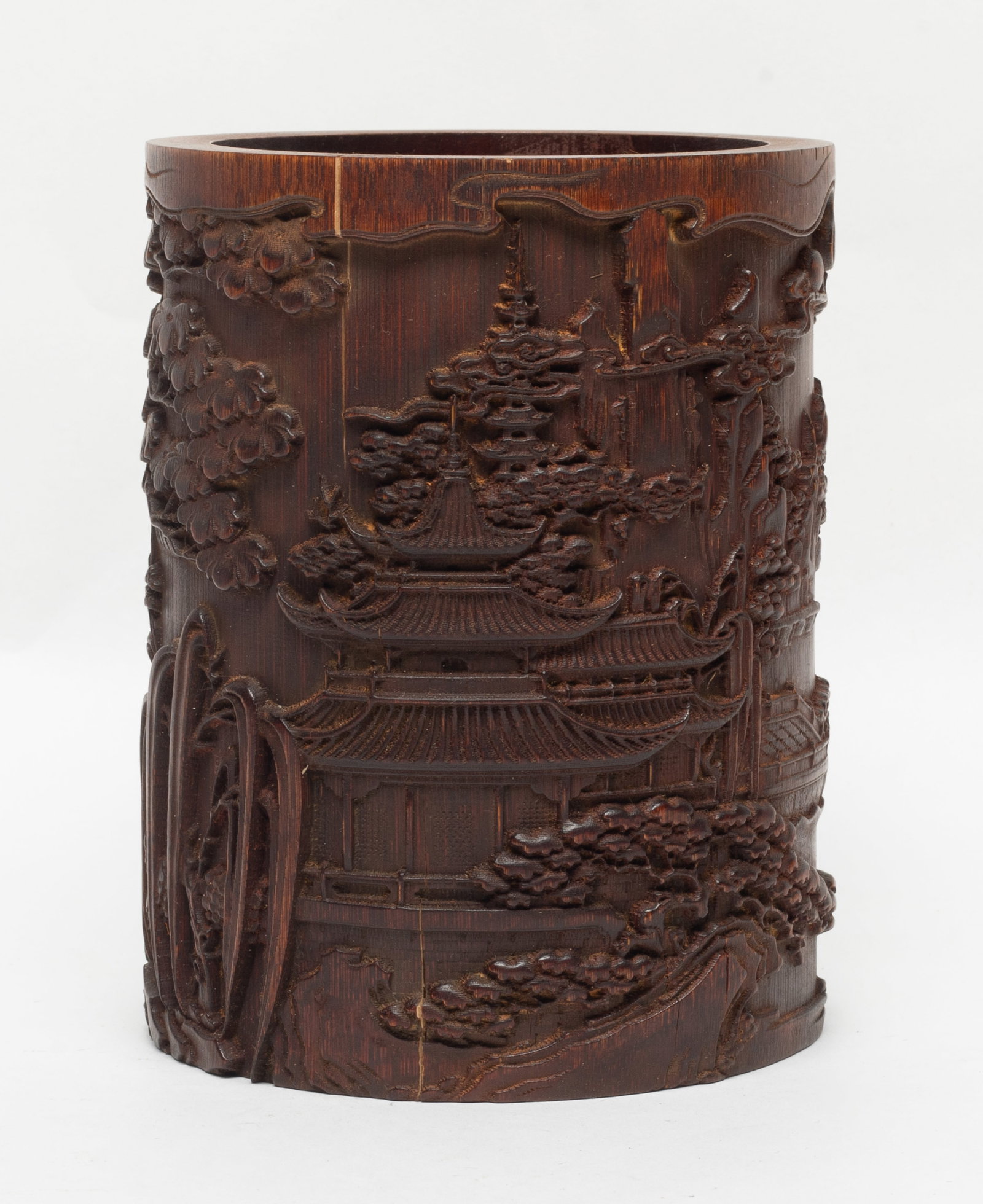 Collectible Chinese Bamboo Brush Pot: Collectible Chinese bamboo brush pot, of cylindrical form, carved with continuous landscape scene detailed with pavilion, pine tree and boat scene. Approx. 6.3*4.8 inch