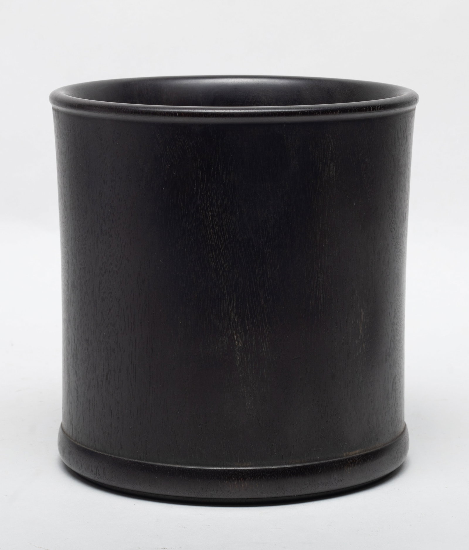 Estate Chinese Hard Wood Brush Pot: Well polished wood brush pot, gently waisted cylindrical form, the bottom pierced with a large circular aperture. Approx. 6.2*6.5 inch