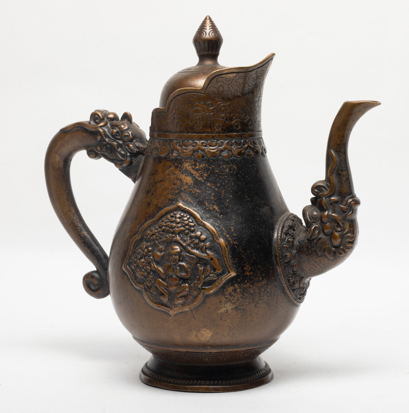 Large Chinese Bronze Temple Used Pot: Of compressed globular form, the exterior carved with a scene of a continuous landscape, the handles and spit cast in archaic beast type. Approx. 10.1*10.6 inch