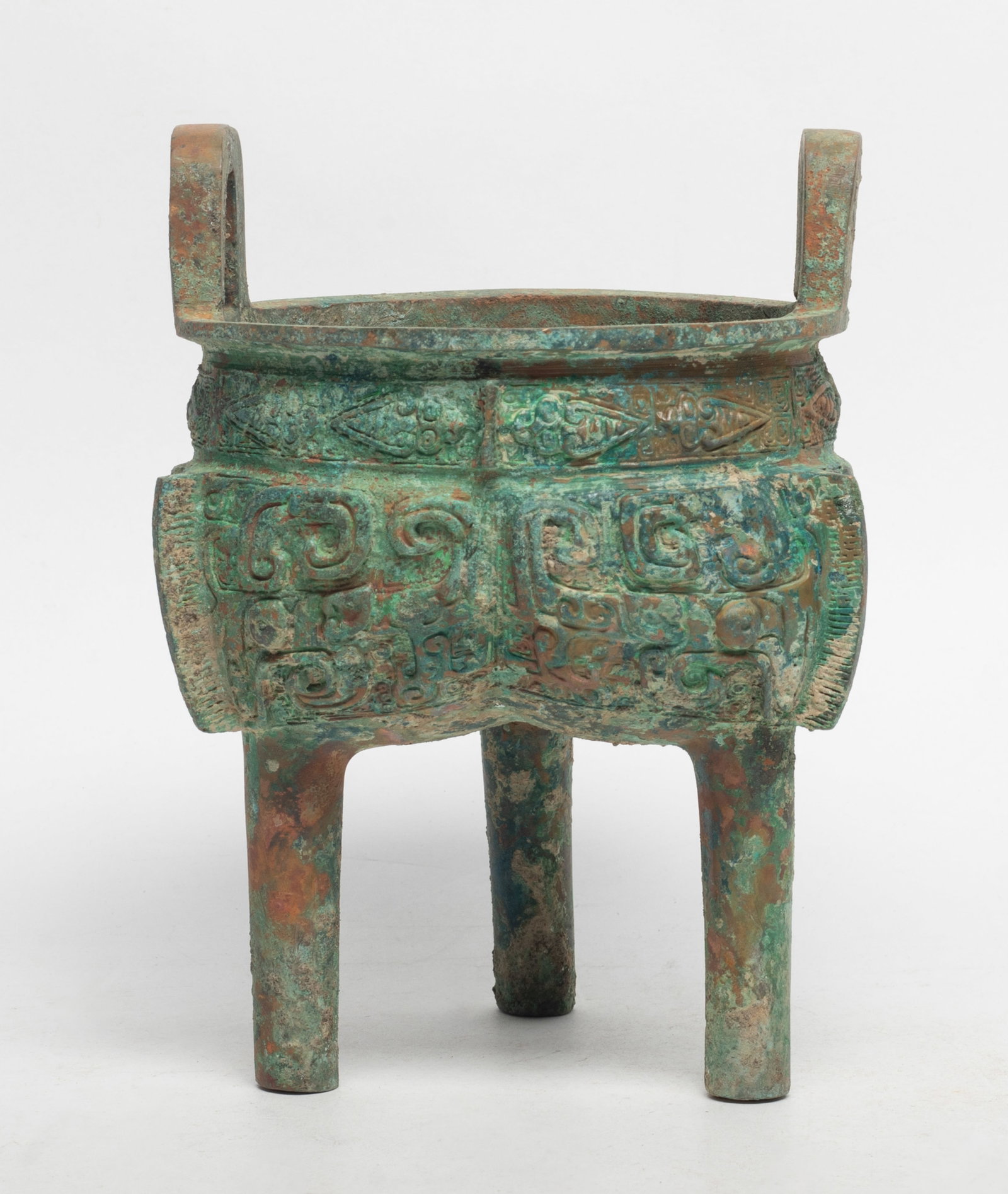 Chinese Bronze Cabinet Censer: Chinese bronze cabinet censer cast with taotie masks. Approx. 6.7*4.9 inch.