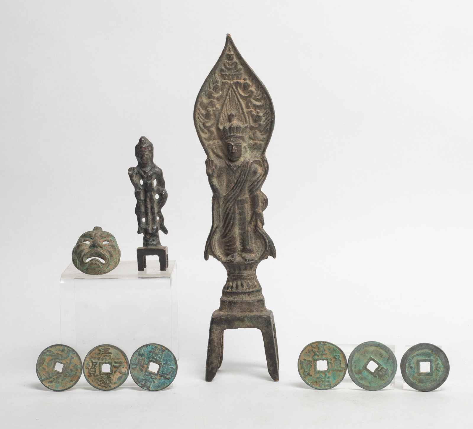 Chinese Fengshui Coins, Old Bronze Buddha: Including six Chinese Fengshui coins, two Buddha sculptures, and a mask pendant. Approx. 9.3*2.2*1.4 inch (largest).