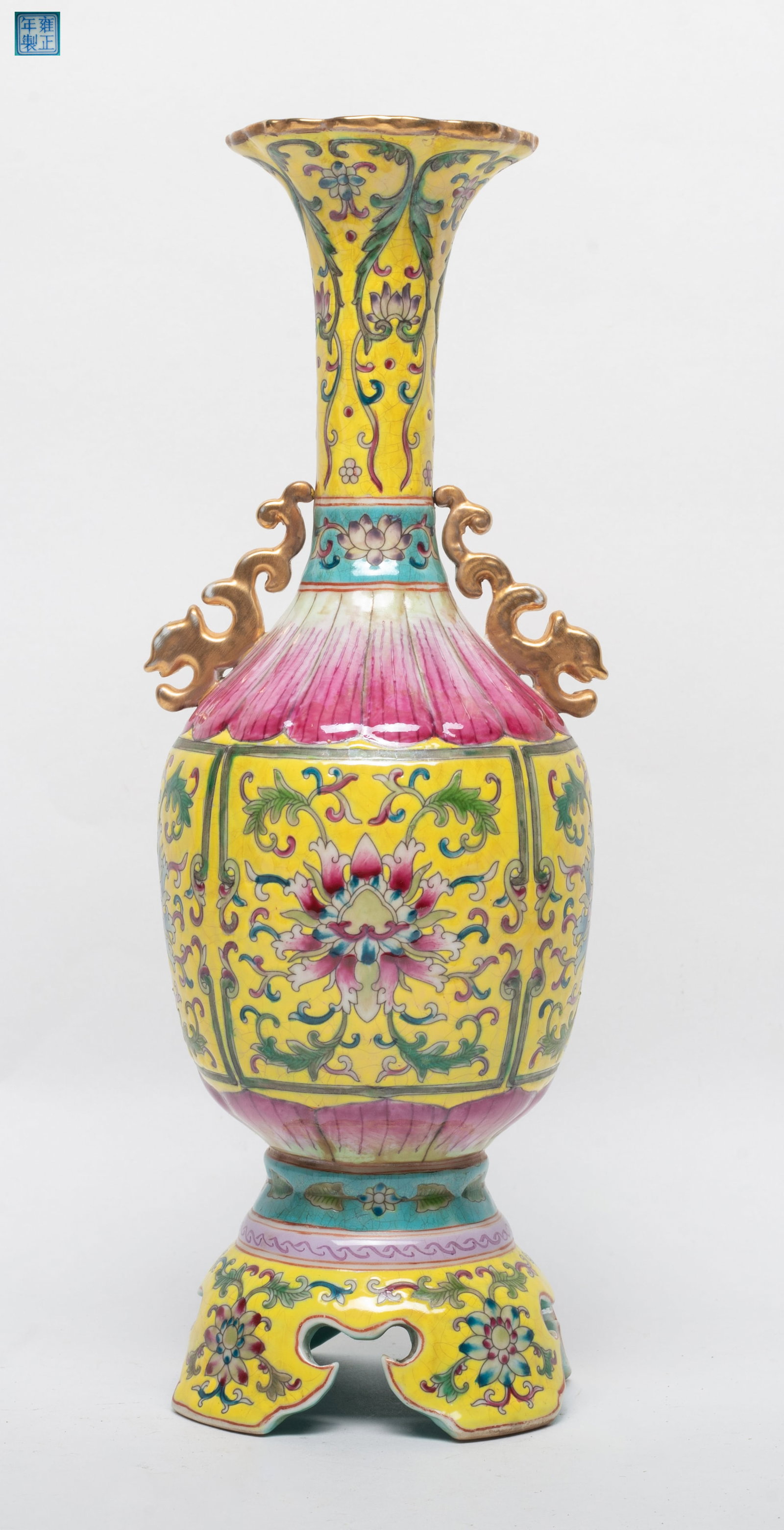 Estate Chinese Export Porcelain Vase: The vase of long slender neck and pedestal base, flanked with a pair of beast handle, featuring a bright yellow tone, decorated with pink lotus petals around the shoulder, the base inscribed with a se