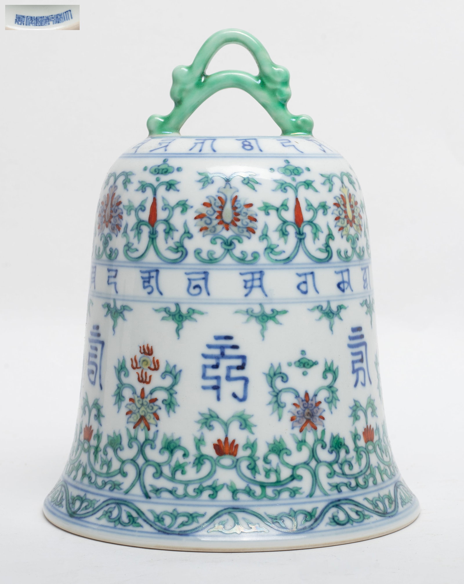 Chinese Douchai Porcelain Bell: Of special bell form, the body decorated with floral scroll, the handle ends with green color glazed beast, the interior come with a six-character mark. Approx. 5.1*6.8 inch
