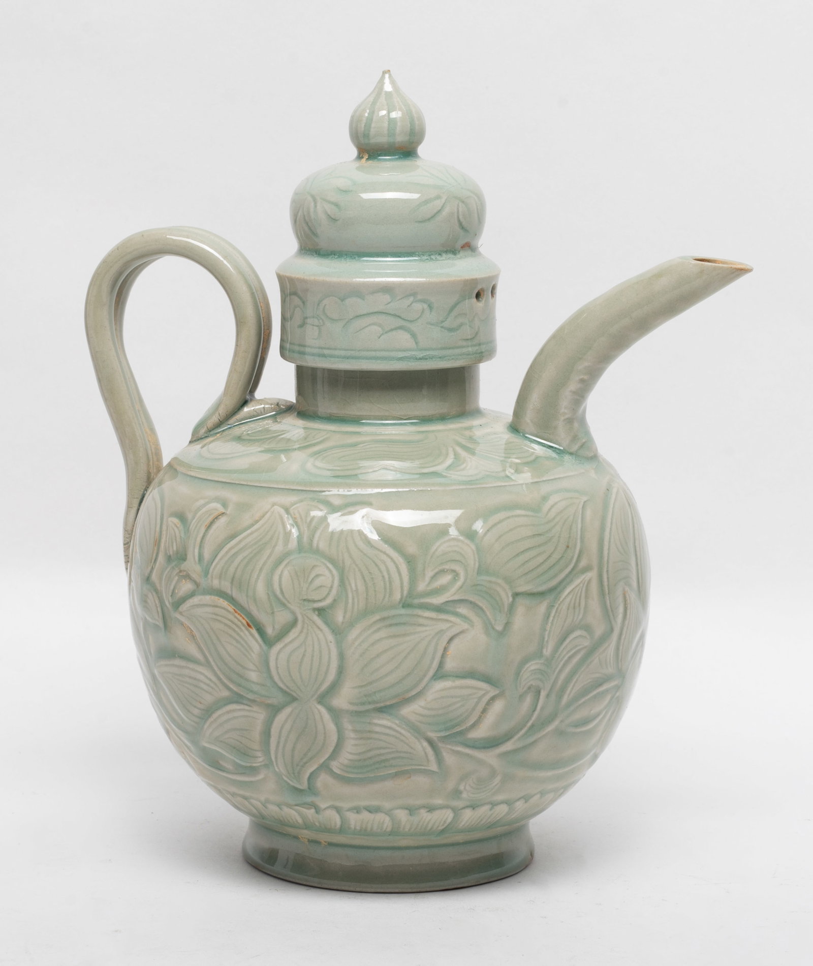 Chinese Yaochou Ware Porcelain Large Pot: The globular body carved with large leafy flower foliage, with match lid. Approx. 8.5*7.3 inch