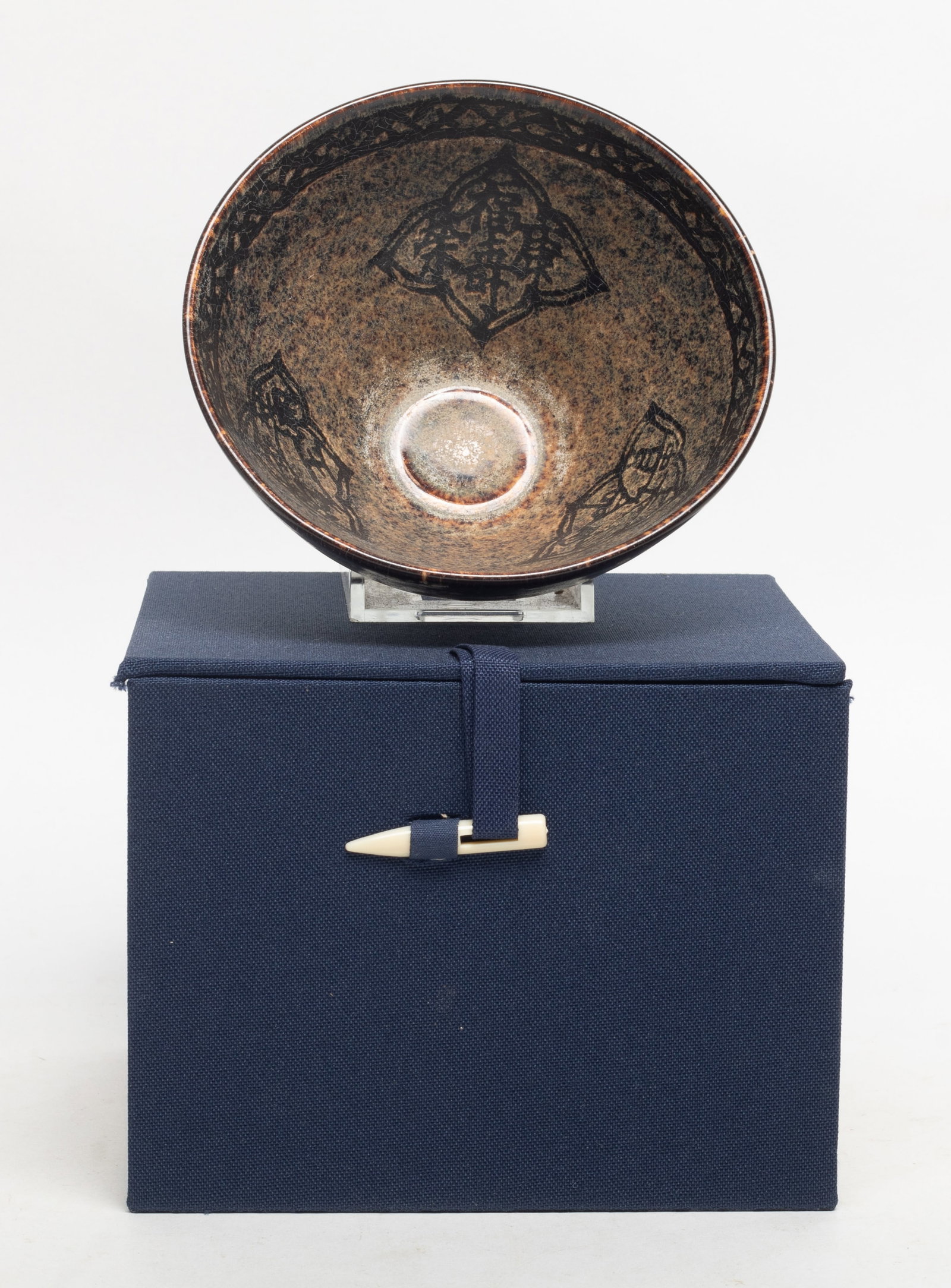 Estate Chinese Shipwreck Type Porcelain Tea Bowl: The bowl interior decorated with an imprint of ruyi heads enclosing characters, with box. Approx. 4.7*2.5 inch (bowl size).