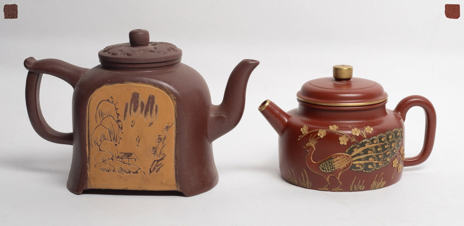 Two Chinese Yixing Zisha Tea Pots: Two Chinese yixing zisha teapots, one painted with phoenix prune pattern, and one decorated with mountain scene. the lid carved with two bats. Approx. 6.8*4.5 inch (larger)