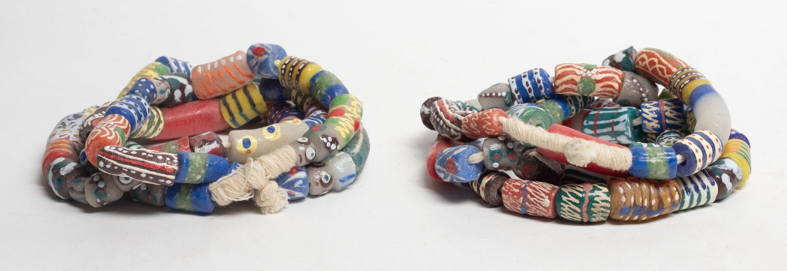 Two World Trade Beads Necklaces: Two world trade beads necklaces. Size varies.