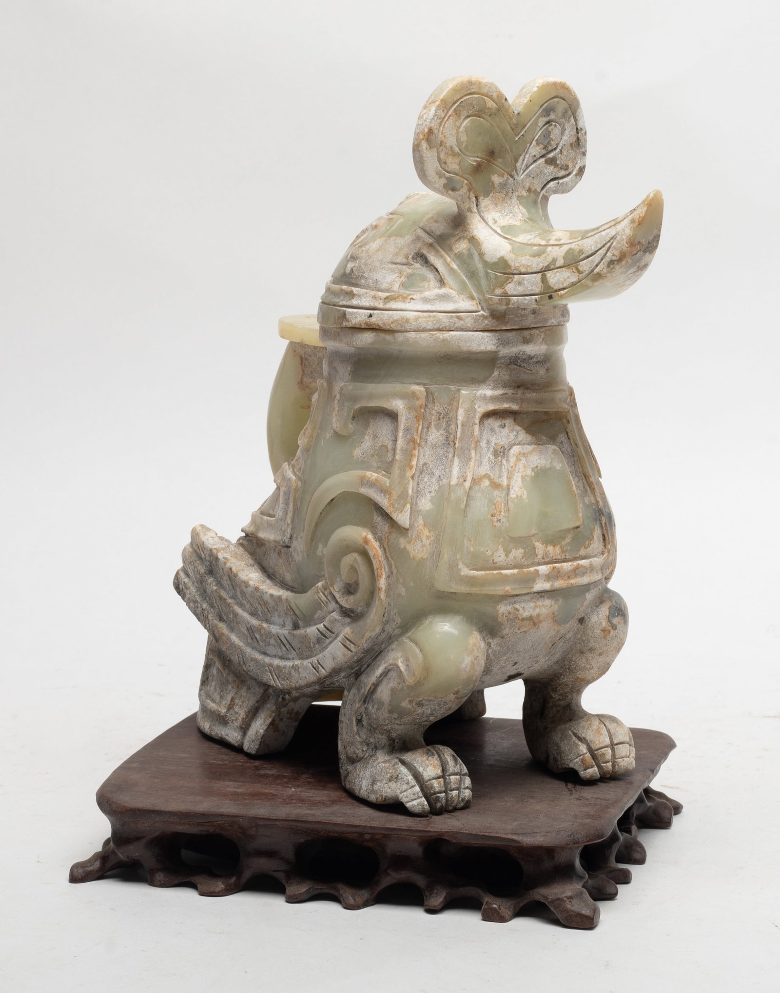 Chinese Export Jade/ Hard Stone Vase: Chinese export jade/hard stone vase, in the form of bird, with a wood stand. Approx. 8.2*7.3 inch (w/o stand)