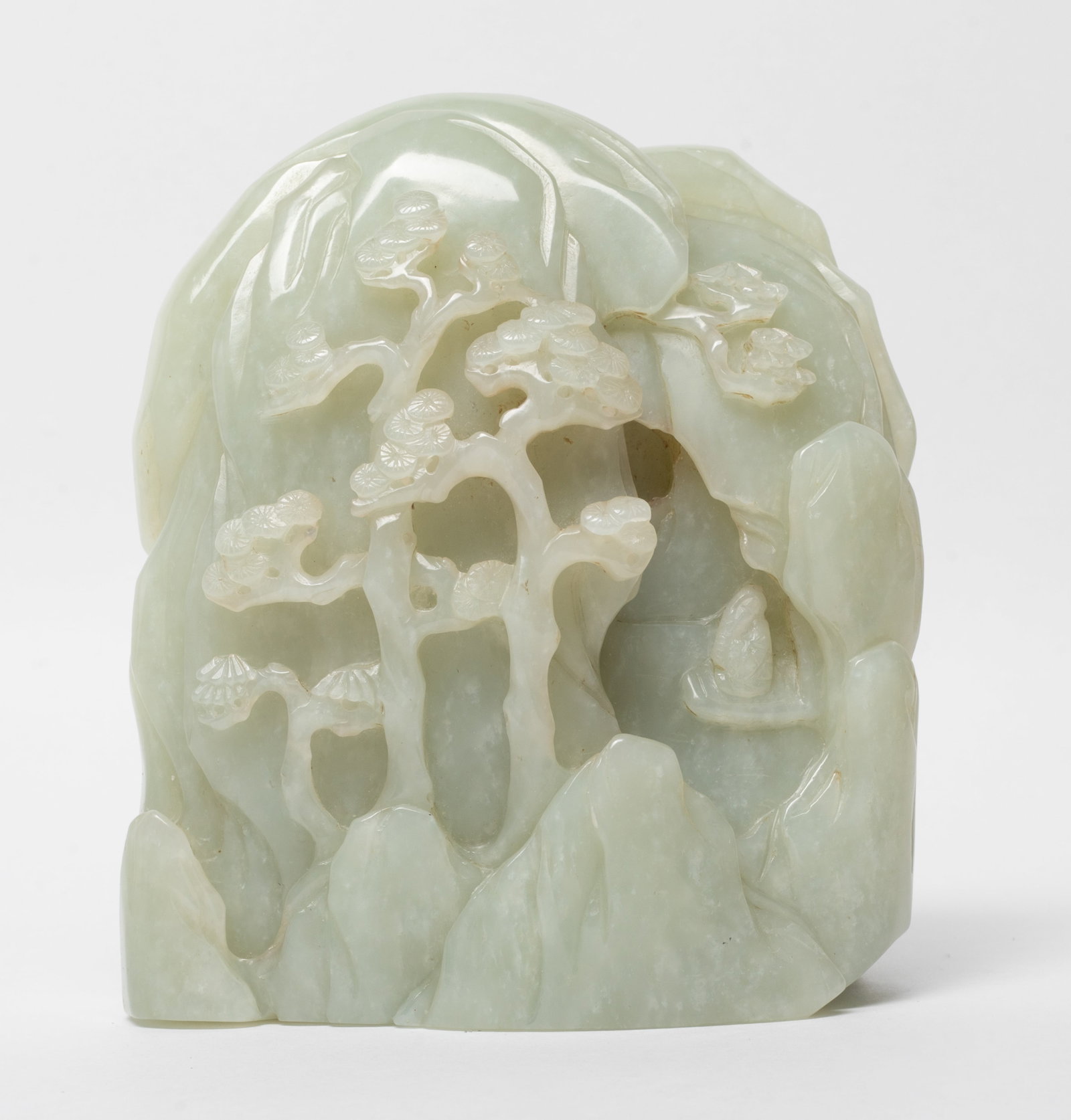 Rare Large Chinese Jade Carved Sculpture: Large Chinese jade sculpture both sides finely carved in multiple layers of high relief as a craggy mountainous landscape, a scholar is sitting under the pine tree. Approx. 4.03*4.70*2.46 inch