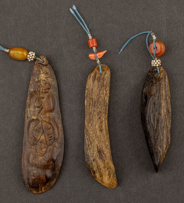 Group of 19th Chinese Antique Agarwood Pendants: Nice Group of three agarwood pendants, uncarved, some small Chinese pendants hanged on it. 8-10.5cm long