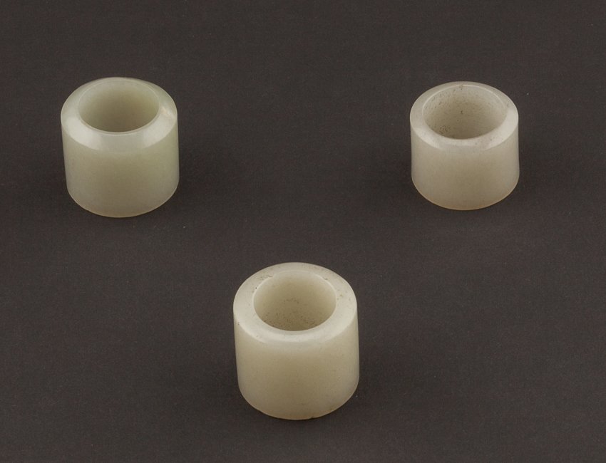Group of 3 Chinese Antique Jade Thumb Rings: 18TH jade thumb rings; in white semi-translucent color all rings are plain, nicely shaped, 2 cm inner diameter