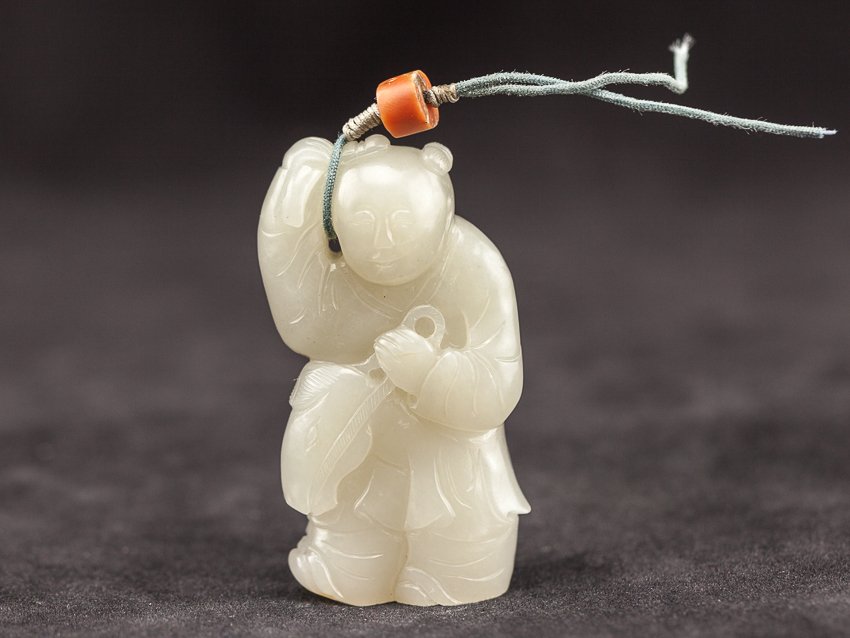 Chinese Antique White Jade Boy With Horse Late: 18TH early 19TH white jade boy with horse; off-white color jade carved boy holding a horse, a string is attached on the top with a coral bead on it. 5.5cm long