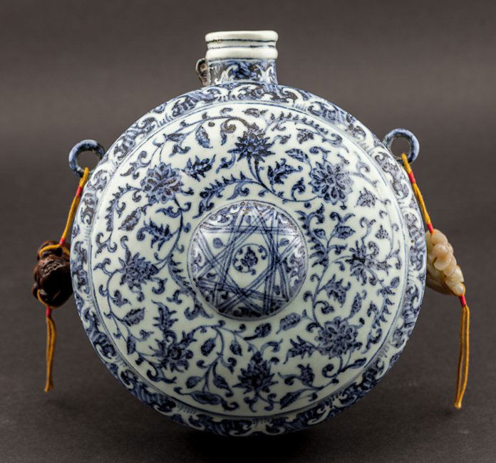 Chinese Antique Blue and White Porcelain Moon Vase: Rare and antique;of blue and white color moon vase,used to wine set.a jade and netsuke suspending on the each side.This item comes from the estate of the Mr.Maza ,collected between 1970 and 1950 in Lo