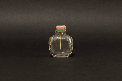 19th Chinese Antique Rock Crystal Snuff Bottle: 19th Chinese antique Qing Taokuang period rock crystal snuff bottle.Perfume bottle,flattened rectangular form,polished well,with Jiaotu dragon's head faux-ring handles in relief.pink tourmaline and me