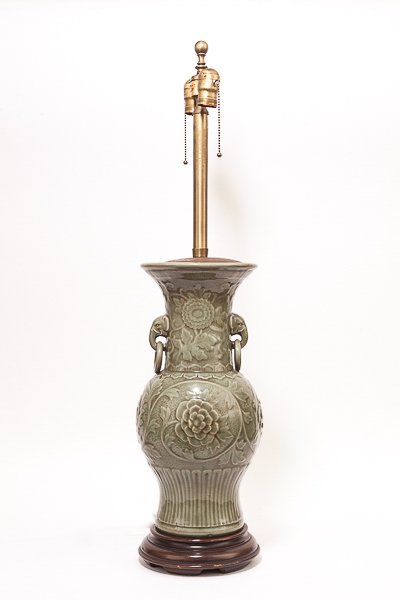 Chinese Antique Longquan Ware Porcelain Vase: Rare and antique Qing dynasty Qianlong longquan ware huge lamp vase; the tall waisted necks supporting small elephant shaped handles and covered in olive-green glaze and lotus ground rising from the g