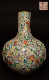 Chinese Antique Rose Famille Porcelain Vase: the tall cylindrical neck surmounting a globular body; the wall painted with thousands of flowers; the recessed base bearing the six-character mark in red and gilt surrounded by turquoise enamels; Qia