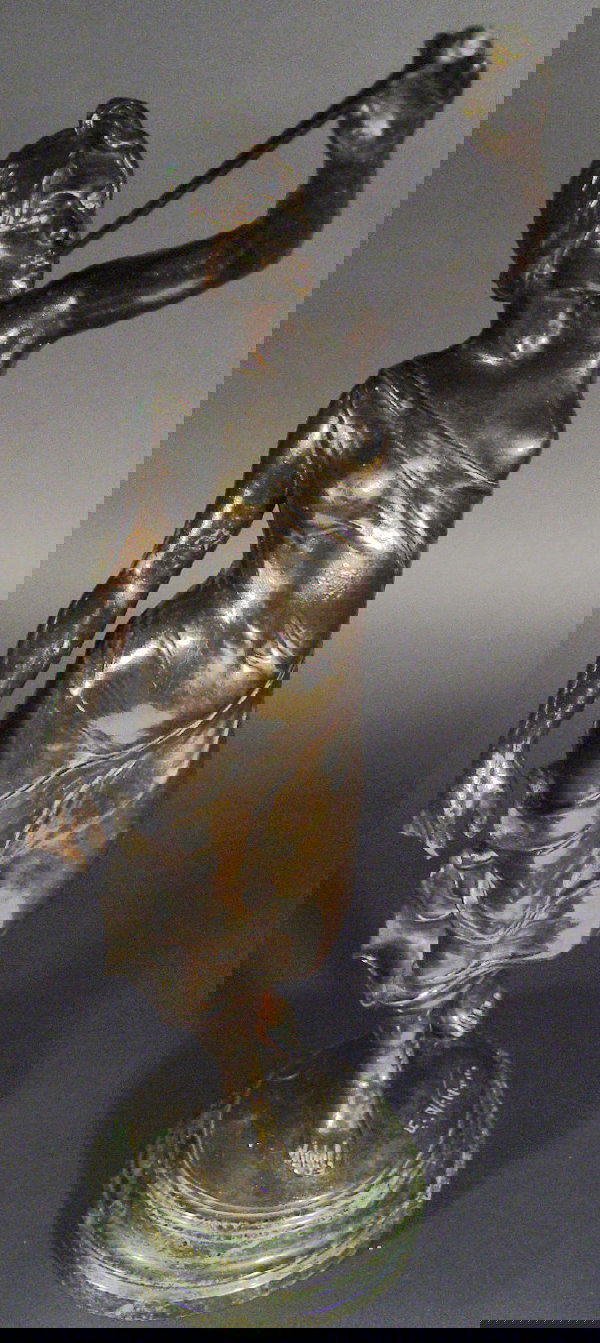 Spelter figurine in robes after a model by 'E.Vill: Spelter figurine in robes after a model by 'E.Villanio' on a green marble base, signature and factory marks to the base, 55cm high