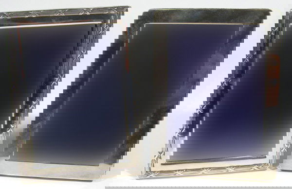 Two rectangular silver photo frames, both hallmar: Two rectangular silver photo frames, both hallmarked, each 16cm by 12cm
