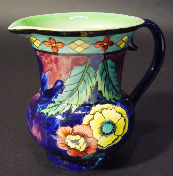 1239 H & K Tunstall pottery jug, hand coloured and tra