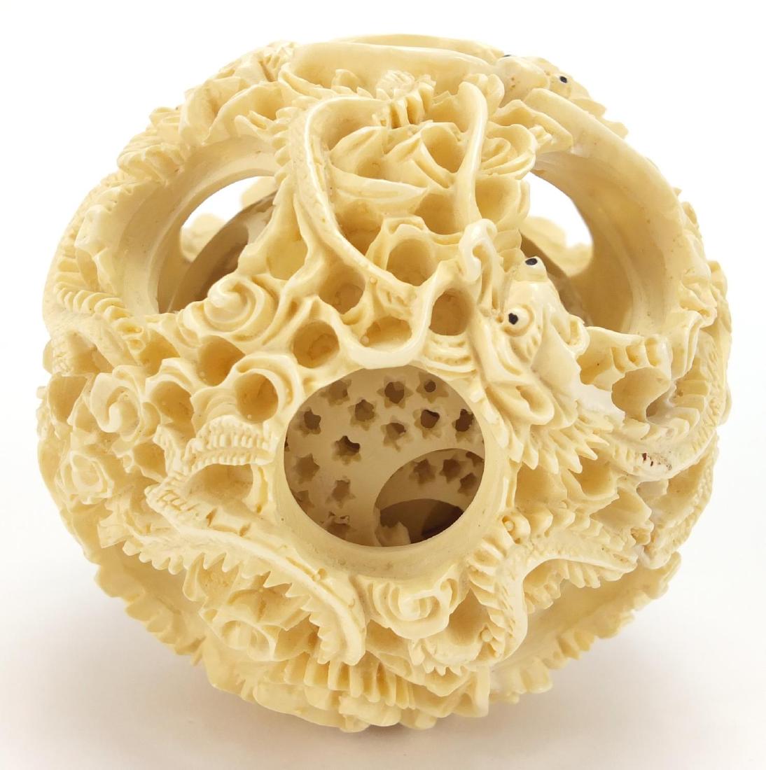 Large Chinese ivory puzzle ball, carved with dragons