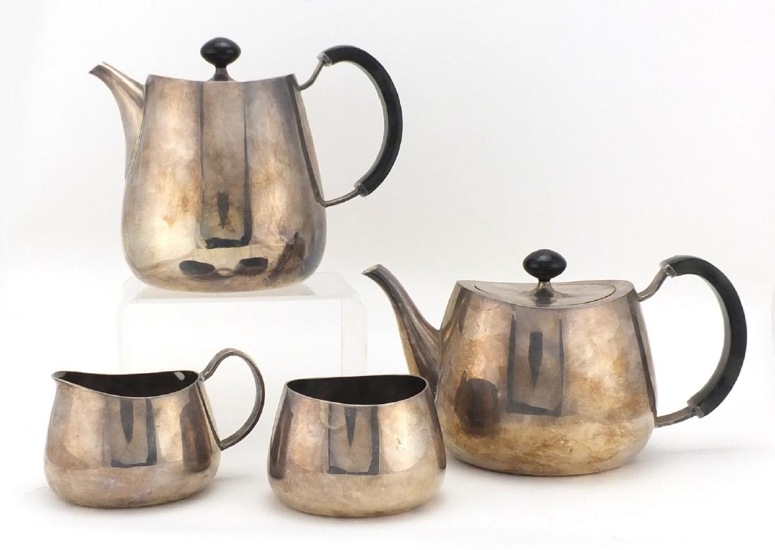 Walker & Hall four piece silver plated 'Pride' tea set,: Walker & Hall four piece silver plated 'Pride' tea set, designed by David Mellor, the teapot and coffee pot with ebonised handles and knops, each with factory marks and numbered 53722, the largest 16.