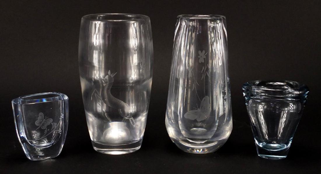 Four clear art glass vases, three with etched design,: Four clear art glass vases, three with etched design, including Holmegaard and Orrefors, the largest 18cm high
