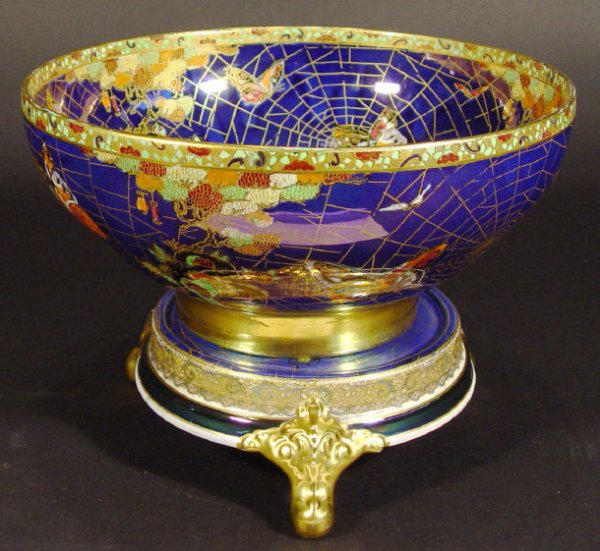 Carltonware Art Deco bowl on stand, finely enamell: Carltonware Art Deco bowl on stand, finely enamelled and gilded with butterflies amongst spiders' webs and flowers, printed factory mark and numbered 9023 to the stand, the bowl 25cm diameter