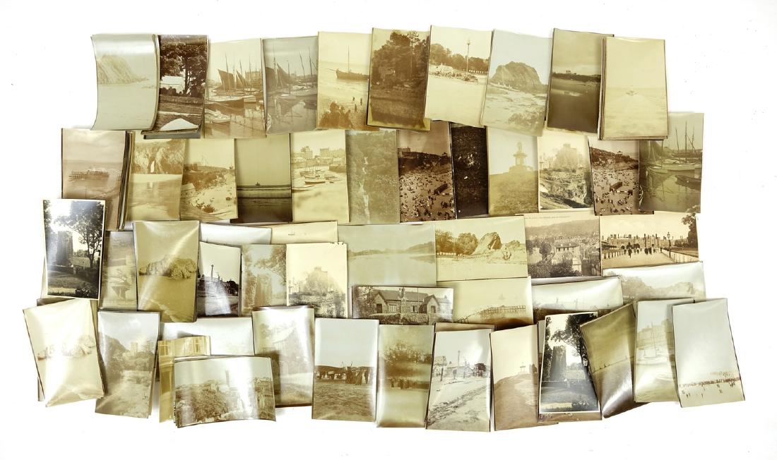 Mostly black and white photographs and postcards: Mostly black and white photographs and postcards including street and beach scenes