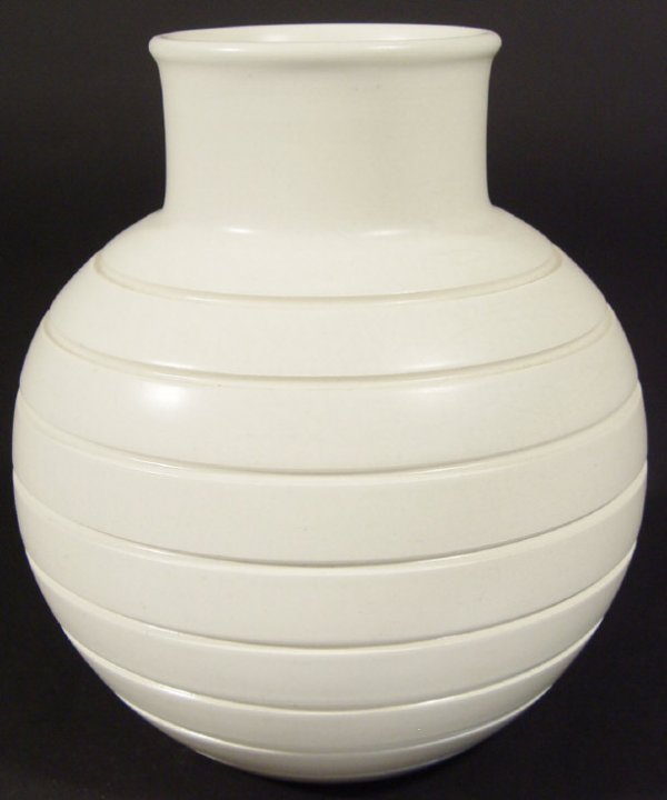 Wedgwood Keith Murray white glazed football vase,: Wedgwood Keith Murray white glazed football vase, printed factory marks and full signature to the base, 16cm high