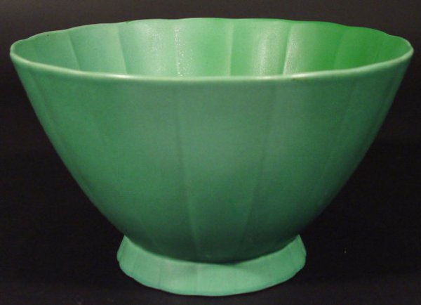 Wedgwood Keith Murray green glazed vase of fluted: Wedgwood Keith Murray green glazed vase of fluted form, printed and impressed factory marks and full printed signature to the base, 13cm high