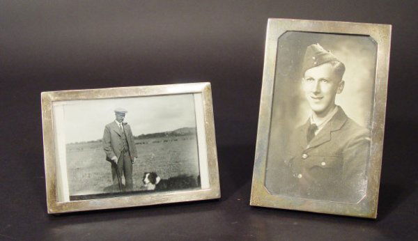Two rectangular silver photo frames, London and Bi: Two rectangular silver photo frames, London and Birmingham assay marks, the largest 9cm x 14cm