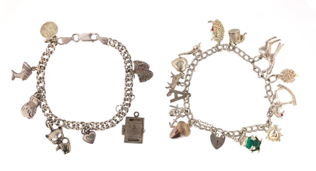 Two silver charm bracelets with mostly silver charms,: Two silver charm bracelets with mostly silver charms, including rocking horse, hedgehog and theatre masks, approximate weight 45.2g