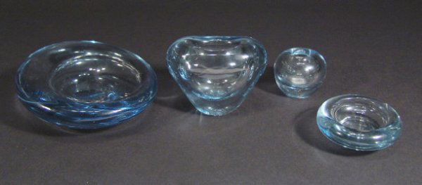 Four Holmegaard blue glass dishes and vases, each: Four Holmegaard blue glass dishes and vases, each with engraved factory marks to the bases, the largest item 8cm high