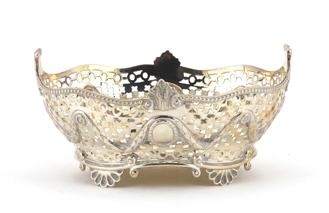 Victorian silver basket, pierced and embossed with: Victorian silver basket, pierced and embossed with swags, by Charles Stuart Harris London 1895, 18.5cm wide, approximate weight 287.5g